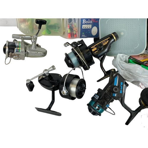 636 - Fishing equipment. Including a Hardy line, Mitchell, Alpha, Olympic, Shakespeare reels, hooks and fl... 