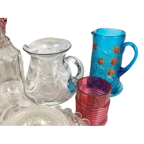 727 - Quantity of Victorian and vintage glassware. Jugs, decanters, glasses, plates and an oil lamp. Large... 