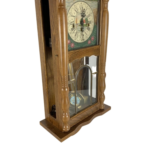 759 - Victorian style wall clock. With key and pendulum. 79cm.