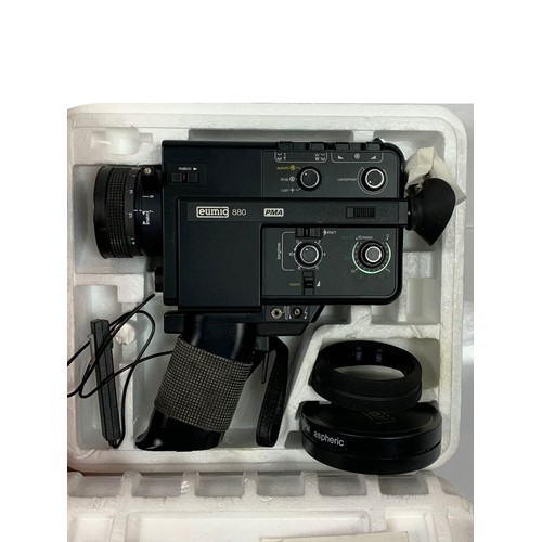 231 - 1970s Eumig 880 PMA camera in box with accessories.