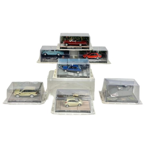 373a - 7 James Bond 007 model cars in display cases. 18cm