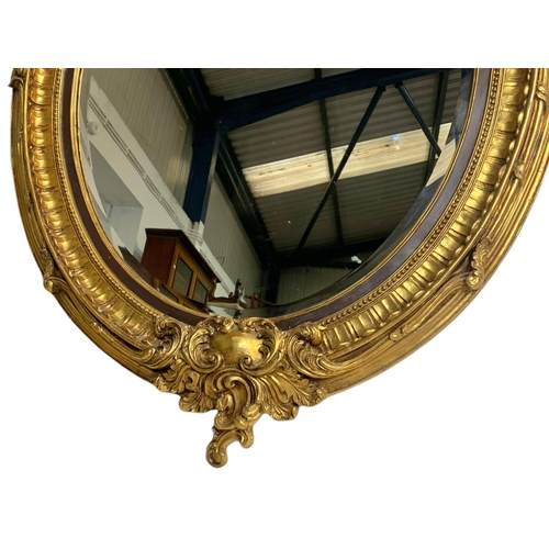 1204 - Large Victorian style ornate gilt framed mirror. 104 x 151cm