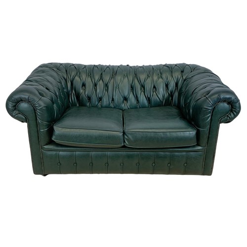 1213 - Faux leather Chesterfield 2 seater sofa.