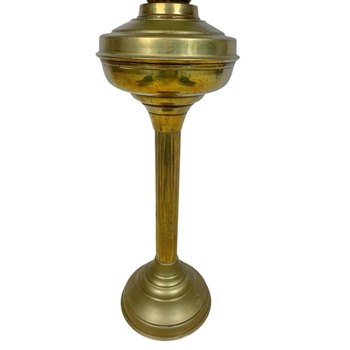 15 - Large early 20th century brass oil lamp. 71.5cm