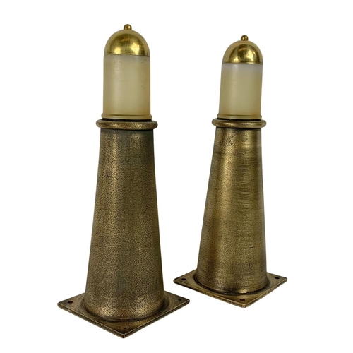 75 - Pair of gun metal lamps in the form of light houses. 33cm