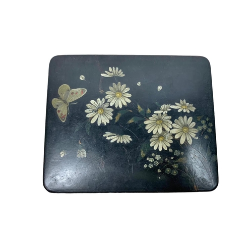 115 - Early 20th century lacquered box with hand painted flower and butterfly decoration. 18 x 15 x 6cm