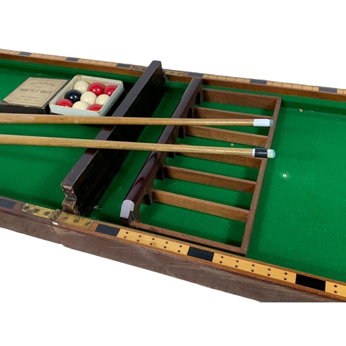 43 - Edwardian bagatelle game by E. J. Riley. Opened 183cm. Closed 91 x 51cm.