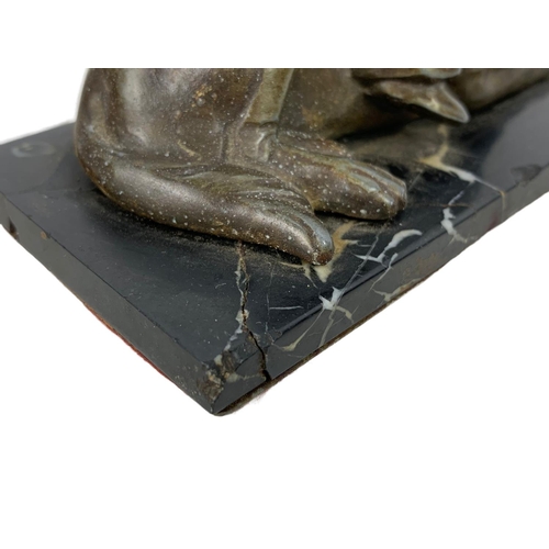 59 - French Art Deco bronze figure on a slate base. 17 x 11cm