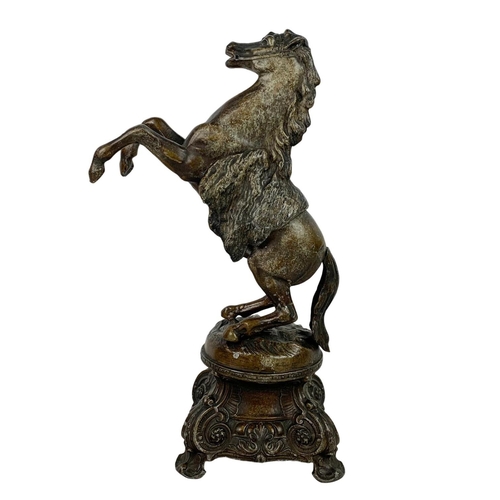 146 - Early 20th century spelter horse. 37cm.