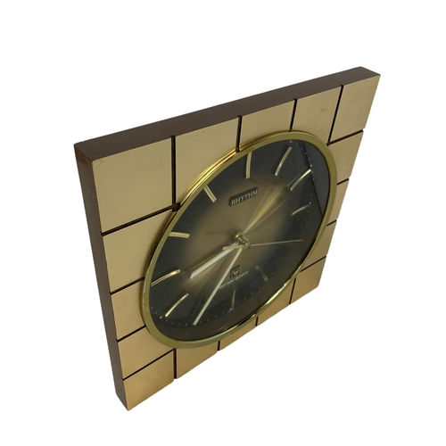 159 - Wall clock by Rhythm. Circa 1970. 26 x 26cm