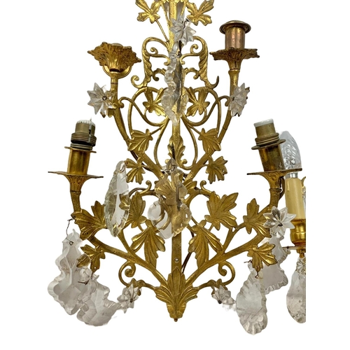 194 - 3 early 20th century gilded brass wall sconces. With glass droplets. Circa 1920/30. Largest 47cm