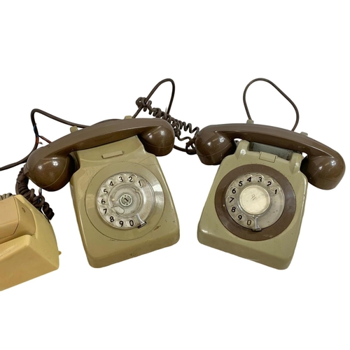 196 - 4 vintage telephones.