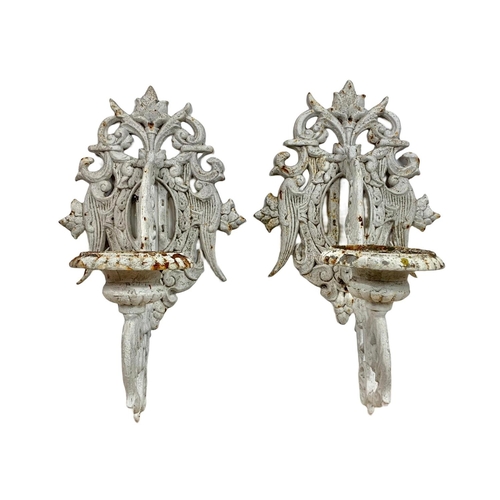 204 - Pair of large early 20th century heavy cast iron wall sconces. Circa 1900/1920. 60cm.