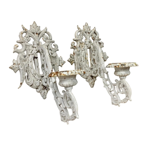 204 - Pair of large early 20th century heavy cast iron wall sconces. Circa 1900/1920. 60cm.