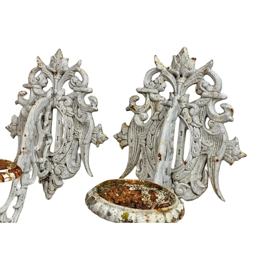 204 - Pair of large early 20th century heavy cast iron wall sconces. Circa 1900/1920. 60cm.