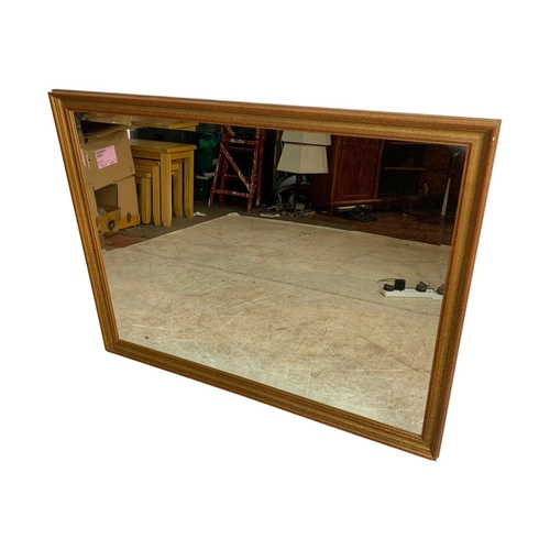 206 - Large gilt framed bevelled mirror. 111 x 85cm