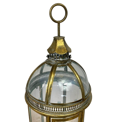 215 - Large ornate brass lantern. 79cm