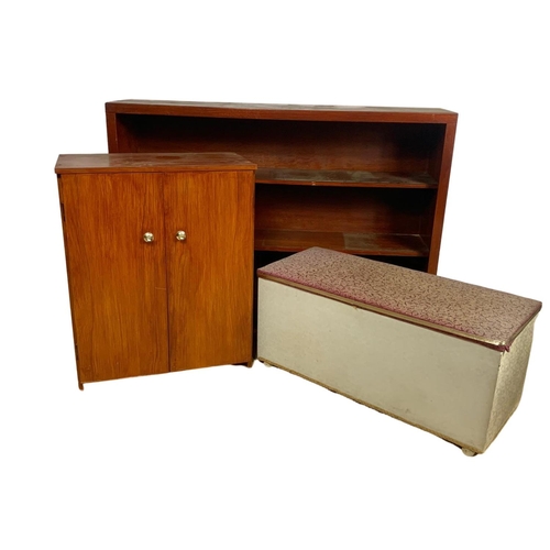 1180 - 3 pieces of furniture. Vintage ottoman storage box, 2 door cupboard and a large shelving unit. Shelv... 