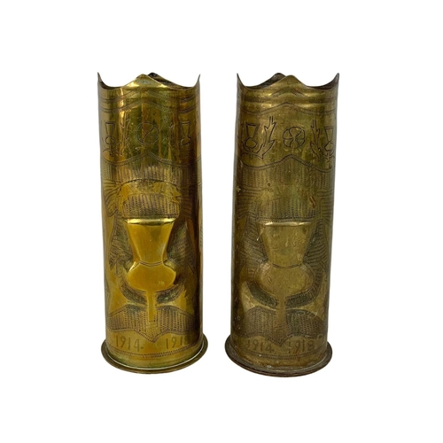 180 - Pair of Trench Art vases. 23cm