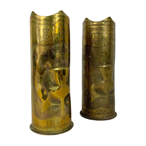 180 - Pair of Trench Art vases. 23cm