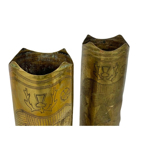 180 - Pair of Trench Art vases. 23cm