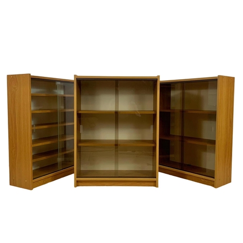 1179 - 3 mid century teak veneer bookcases. 60 x 23 x 80cm