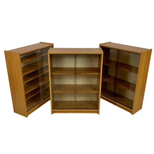 1179 - 3 mid century teak veneer bookcases. 60 x 23 x 80cm