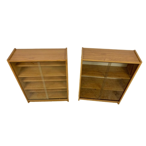 1179 - 3 mid century teak veneer bookcases. 60 x 23 x 80cm