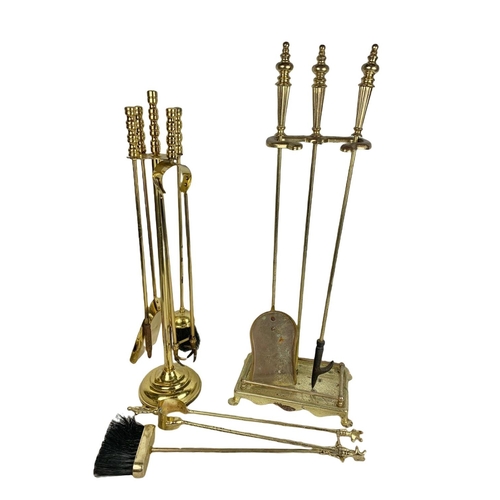 370 - 2 large vintage brass companion sets. 72.5cm