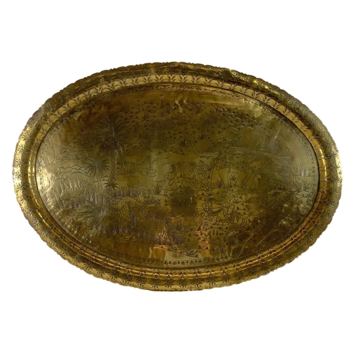 378 - Large 19th century Indian brass tray. 76 x 54cm