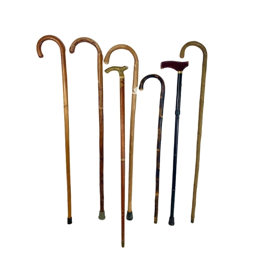 380 - Quantity of walking sticks. 93cm