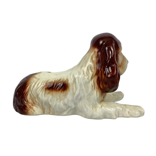 544 - 2 pottery dogs by Sylvac. Largest 17cm