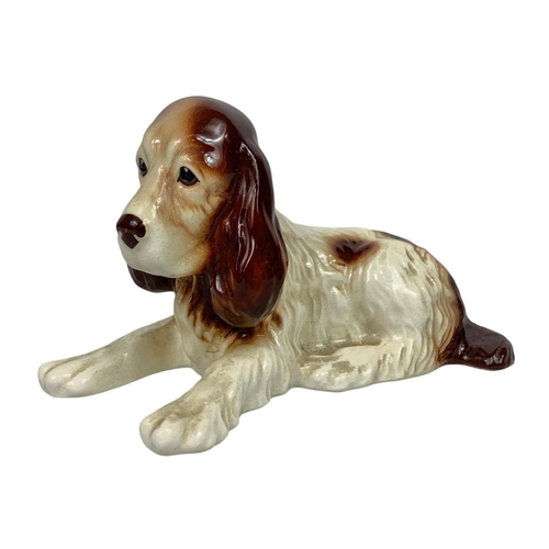 544 - 2 pottery dogs by Sylvac. Largest 17cm