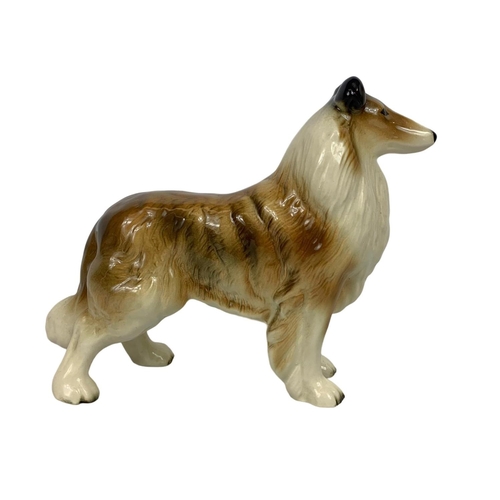 549 - Goebel pottery dog 1960, large pottery dog and a figurine. Dog measures 22 x 19cm