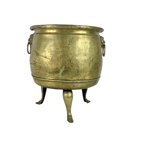 312 - Large Victorian brass coal bucket with hoof feet and ring side handles. Circa 1890. 38 x 38.5cm