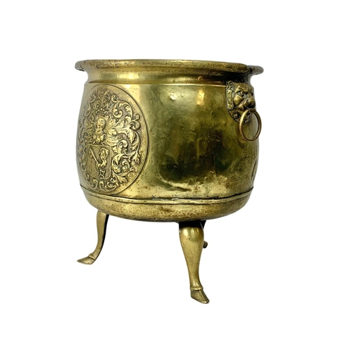 312 - Large Victorian brass coal bucket with hoof feet and ring side handles. Circa 1890. 38 x 38.5cm