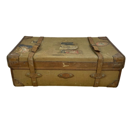 111 - Large vintage leather bound travelling trunk. 92 x 57 x 33cm