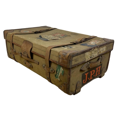 111 - Large vintage leather bound travelling trunk. 92 x 57 x 33cm