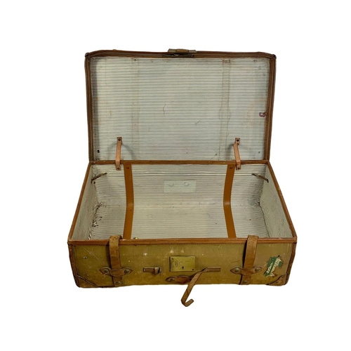 111 - Large vintage leather bound travelling trunk. 92 x 57 x 33cm