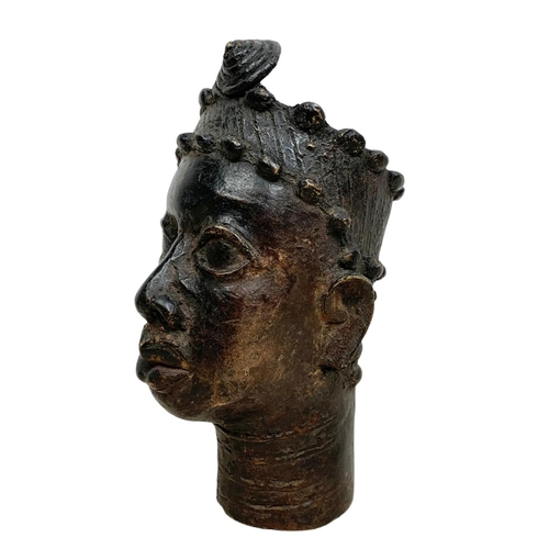 121 - An early 20th century Benin bronze bust. 17.5cm