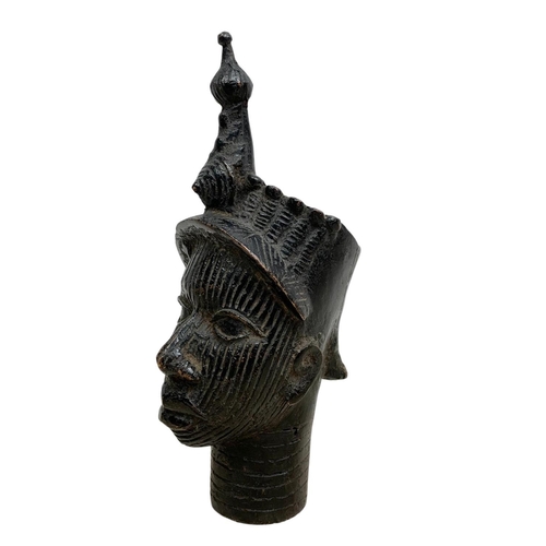 122 - An early 20th century Benin bronze bust. 20.5cm.