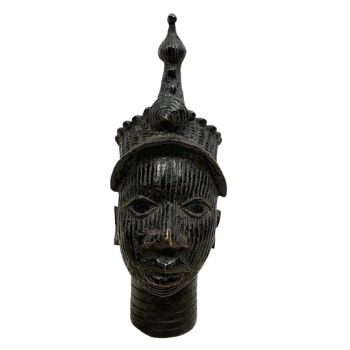 122 - An early 20th century Benin bronze bust. 20.5cm.