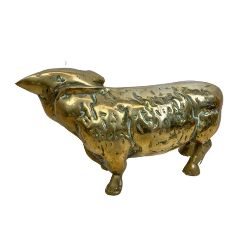 125 - Quantity of vintage brassware. Including a large heavy brass cow 24cm, a pair of brass flower patter... 