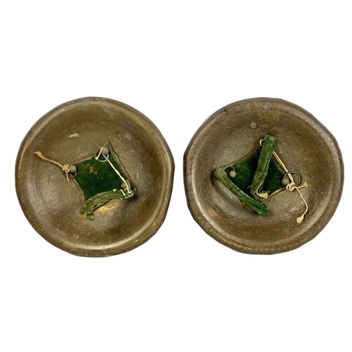 138 - A pair of early 20th century Far Eastern decorative brass shields. Circa 1910-1910. 32cm