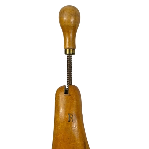 139 - A pair of early 20th century shoe stretchers by Greenwood’s. 23cm, Circa 1920