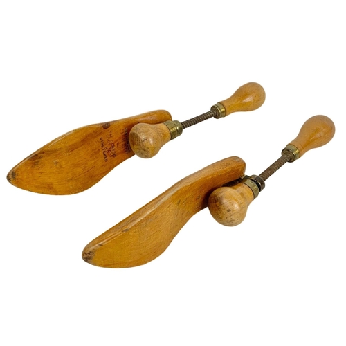 139 - A pair of early 20th century shoe stretchers by Greenwood’s. 23cm, Circa 1920