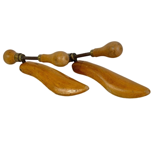 139 - A pair of early 20th century shoe stretchers by Greenwood’s. 23cm, Circa 1920