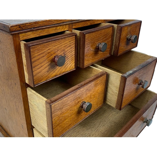 153 - An Edwardian oak 6 drawer miniature chest. 32 x 17.5 x 30cm