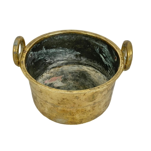 154 - A 19th century brass pot with 2 ring handles. Circa 1880. 24 x 21 x 13.5cm.