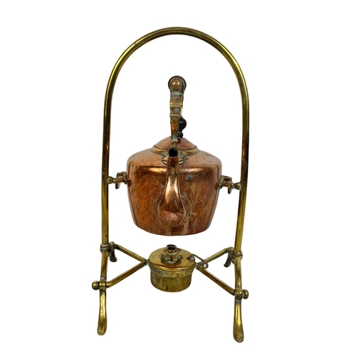 155 - A Victorian copper and brass spirit kettle. 35cm